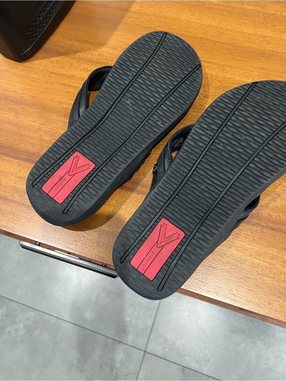 Vionic Men’s Black Flip-Flops with Red Logo Panels